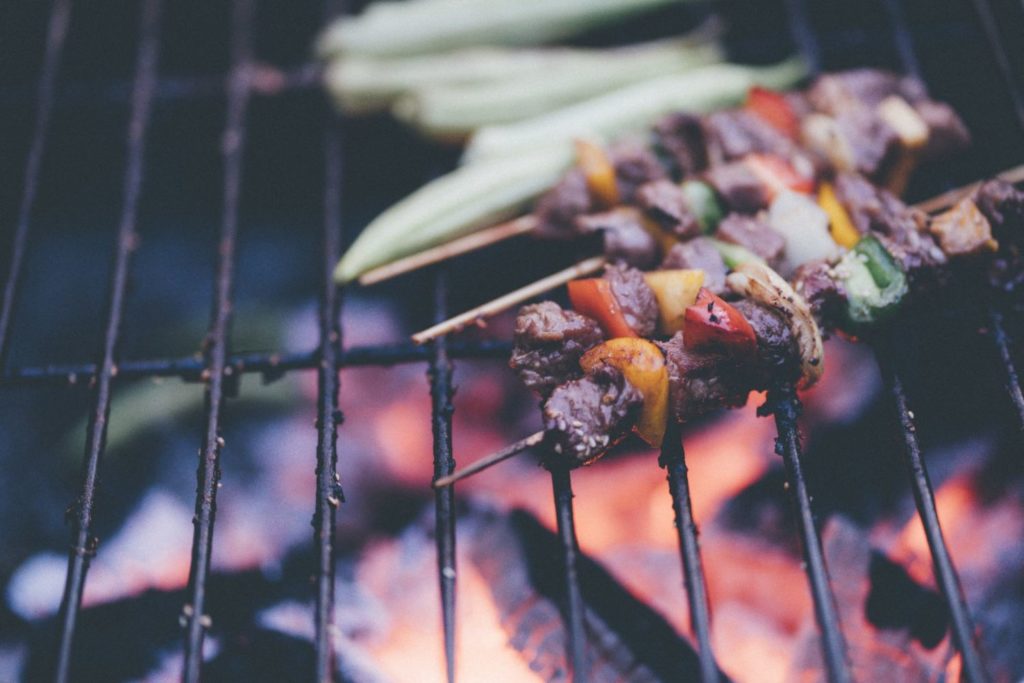 Grilling with kids. Grilled veggies on skewers