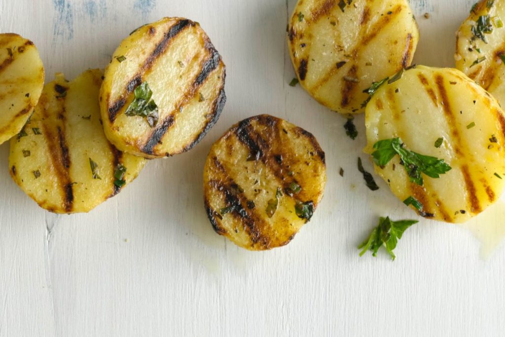 grilled potatoes on a grill basket