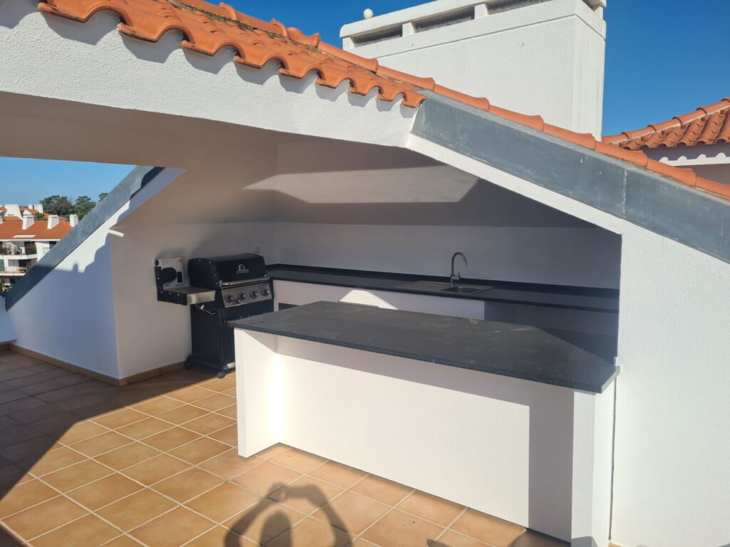 an outdoor cooking area in the algarve
